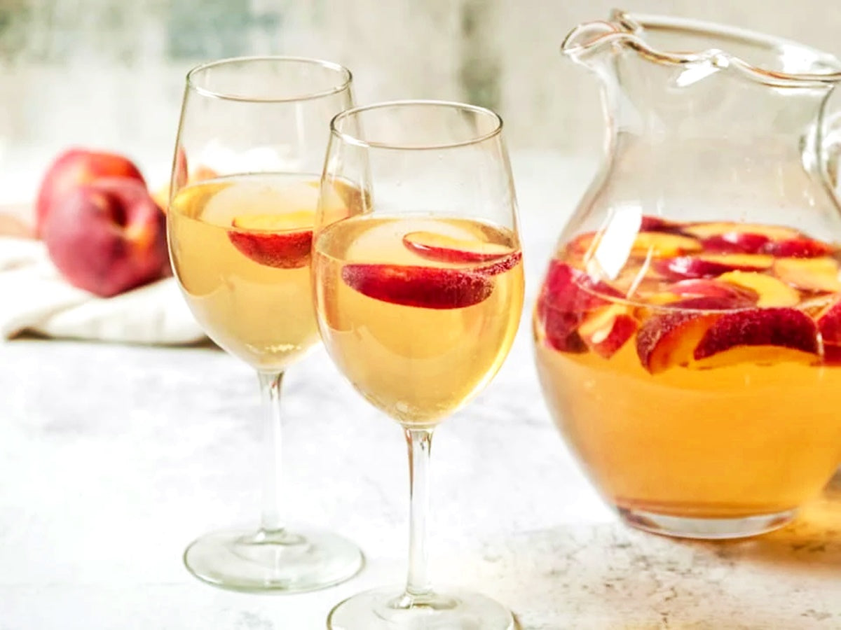 Pesche al vino bianco e menta... una coccola estiva!
